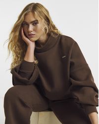 Sculpt Activewear - High Neck Jumper - Lyst