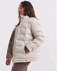 Snowdonia - Padded Showerproof Jacket - Lyst