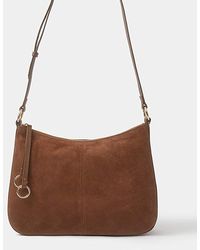 Accessorize - Curved Suede Crossbody Bag - Lyst