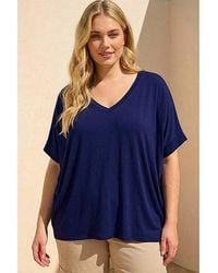 Roman Curve - V-Neck Stretch Top - Lyst