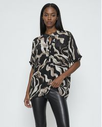 Religion - Swirl Tie Neck Blouse - Lyst