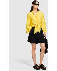 Sisley - Uneven Shirt With Bow - Lyst
