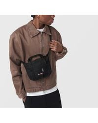 Eastpak - Mini Travel Tote Bag - Lyst