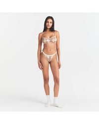 Skims - Logo Picot Thong - Lyst