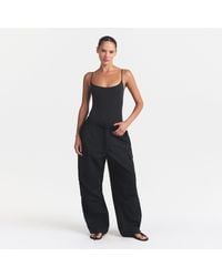 Skims - Cami Bodysuit - Lyst