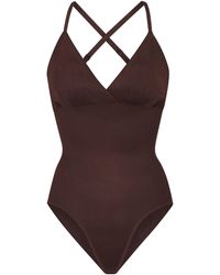 Skims Barely There Shapewear Bodysuit Brief W/ Snaps - Lyst