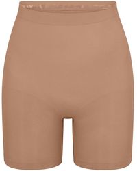 Skims - Seamless Sculpt Mid-Thigh Shorts - Lyst