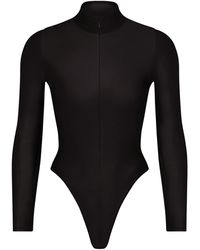 Skims - Zip Front Long Sleeve One Piece - Lyst