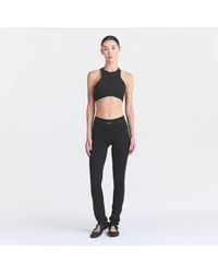 Skims - 34" Straight Legging Obsidian - Lyst