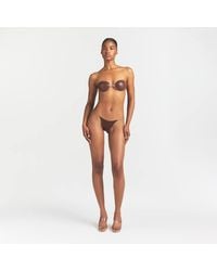 Skims - Clear Strap String Thong - Lyst