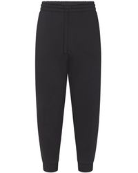 Skims - Tapered Jogger Pants - Lyst