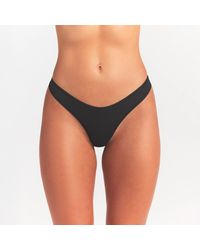 Skims - Fits Everybody Dipped Front Thong - Lyst