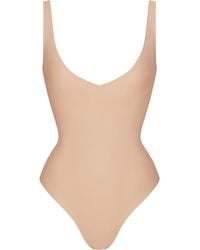 Skims - Unlined Plunge Thong Bodysuit - Lyst