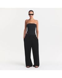 Skims - Strapless Bodysuit - Lyst