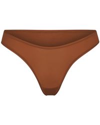 Skims - Dipped Front Thong - Lyst