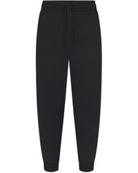 Skims - Tapered Jogger Pants - Lyst