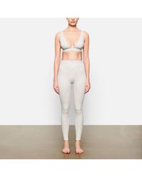 Skims - Cotton Collection Ribbed Cotton-Blend Jersey Leggings - Lyst