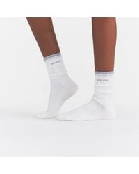 Skims - Ribbed Crew Logo Socks - Lyst
