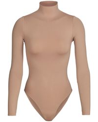 Skims - Essential Mock Neck Long Sleeve Bodysuit - Lyst