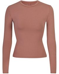 Skims Long-sleeved tops for Women - Lyst.com