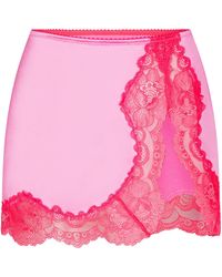 Skims - Lace Low Rise Slip Skirt - Lyst