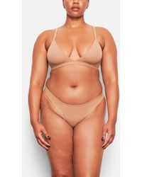 Skims - Fits Everybody Dipped Front Thong - Lyst