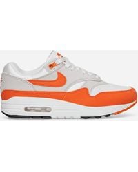 Nike - Wmns Air Max 1 Sneakers Neutral Grey / Safety Orange - Lyst
