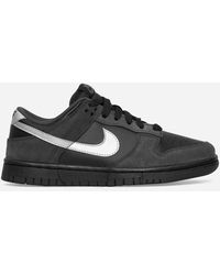 Nike - Women S Dunk Low Sneakers Black / Metallic Silver - Lyst