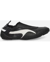 PUMA - Women S Mostro Move Sneakers / White - Lyst