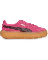 puma platform trace trainers in black with gum sole