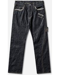 Undercover - Men S People Have The Power Denim Pants Indigo - Lyst