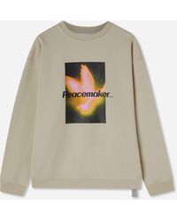 Oamc Peacemaker - Men S Bird Loose Fit Crewneck Sweatshirt Sand - Lyst