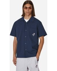 New Balance - Athletics Rich Paul Camp Collar Shirt Navy - Lyst