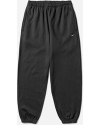 Nike - Men S Solo Swoosh Cuffed Fleece Pants - Lyst