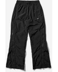 Nike - S Mid-Rise Repel Zip Pants - Lyst