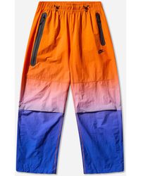 Nike - Tech Woven Pants Game Royal Safety - Lyst