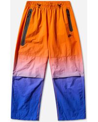 Nike - Tech Woven Pants Game Royal Safety - Lyst