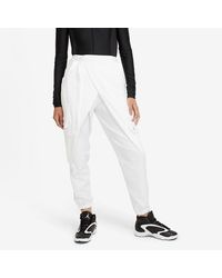 nike black and white popper track pants