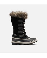 sorel joan of arctic wedge mid shearling