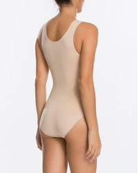 white spanx bodysuit