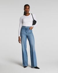 Spanx - Shape Authentic 360 Easy Flare Jeans With Patch Pockets, Elysian - Lyst