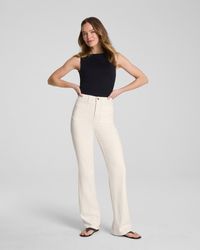 Spanx - Shape Authentic 360 Easy Flare Jeans With Patch Pockets, Alabaster - Lyst