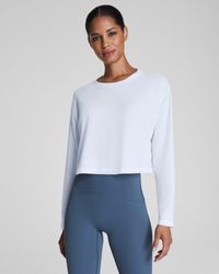Spanx - Outpace Cropped Long Sleeve Top - Lyst