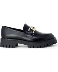 Femme Chaussures Chaussures plates Souliers et mocassins Flat shoes Guess en coloris Noir 