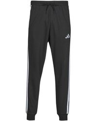 adidas - Jogging Essentials 3-Stripes Fleece Joggers - Lyst