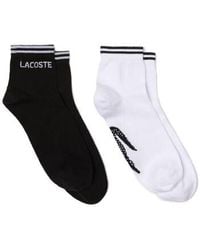 Lacoste - Chaussettes LOT DE 2 PAIRES DE CHAUSSETTES BASSES SPORT EN COTON - Lyst