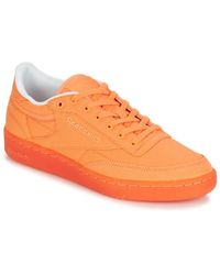 reebok orange trainers