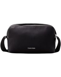 Calvin Klein - Sacoche Sac bandouliere Ref 63239 Noir 21.5*13*5.5 cm - Lyst
