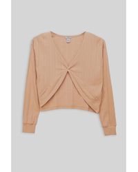 Enorsia - Blouses Top en jersey à devant torsadé avec piqûres et taille haute - Lyst