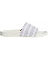 adidas Adilette hommes Claquettes en blanc